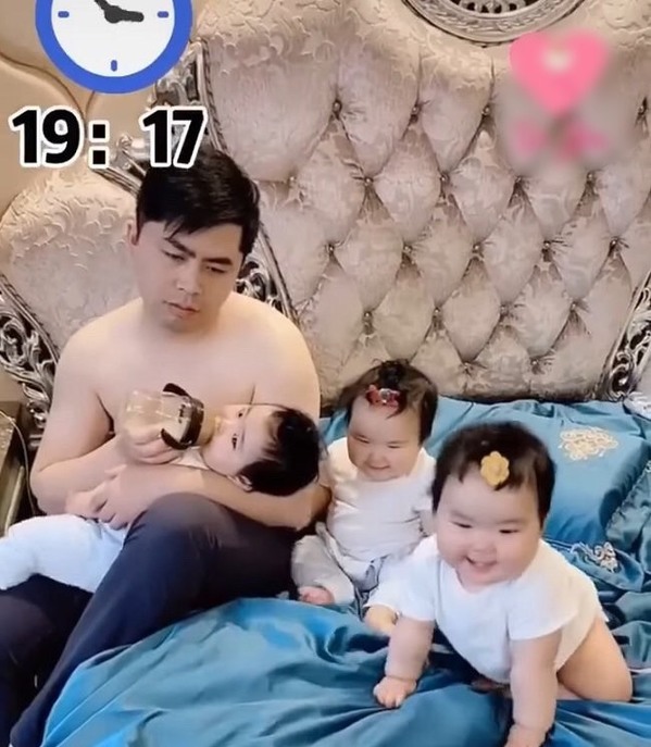  Dù vất vả nhưng nhìn 3 cô con gái nhỏ đáng yêu này thì vẫn phải tiếp tục cố gắng. (Ảnh: Sohu)
