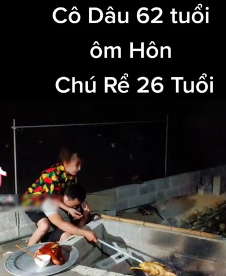  Cô dâu Thu Sao không ngại đến ôm chầm lấy chồng trẻ giữa chốn đông người. (Ảnh: Chụp màn hình TikTok H.H.H)