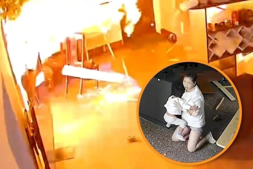 Dù bỏng nặng người phụ nữ vẫn cố gắng quay lại giải cứu con mình. Ảnh: Weixin