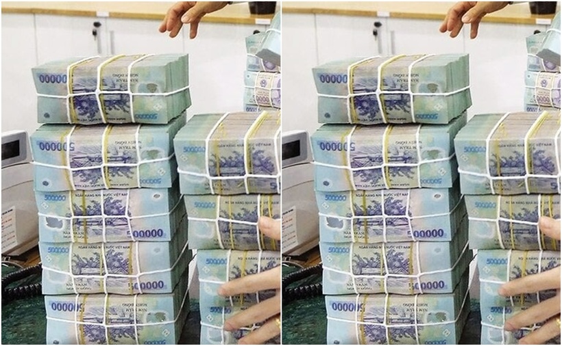 Tờ 500.000 đồng chính thức được lưu hành từ những năm 2003 và có màu xanh lơ tím sẫm.