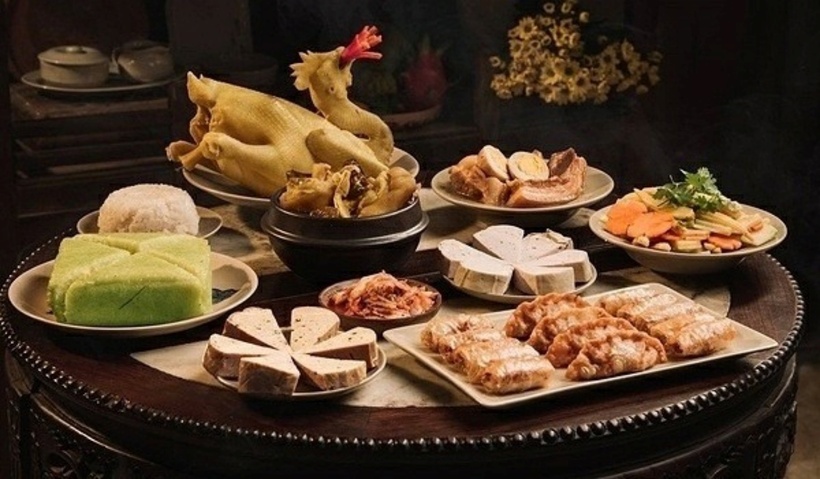 Theo phong tục của người Việt Nam từ cổ xưa, để cúng giao thừa, các gia đình thường chuẩn bị 2 mâm cỗ. Ảnh minh họa.