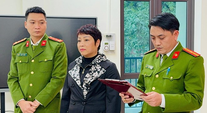 Nguyễn Kim Anh tại cơ quan công an Lào Cai. Ảnh: Lao Động
