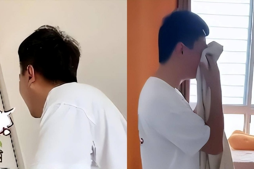 Người chồng bất lực lau nước mắt. Ảnh: SCMP.