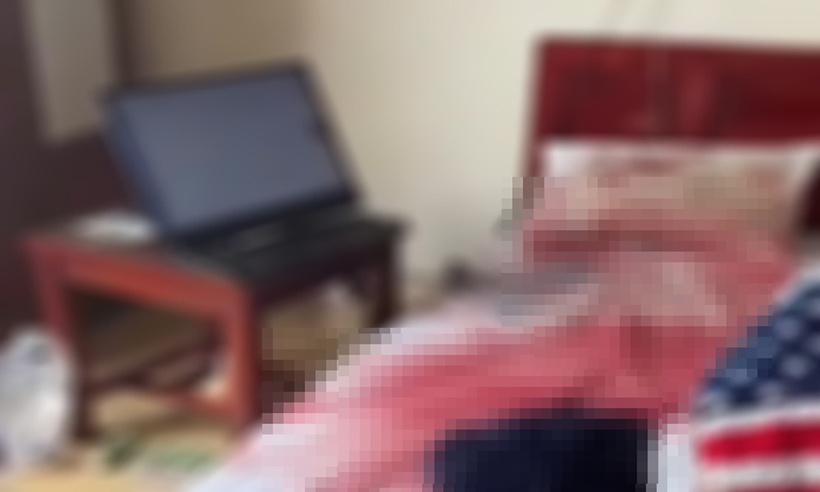 Bên trong căn phòng nơi anh Th. thuê trước khi tử vong. Ảnh: Báo Xây dựng