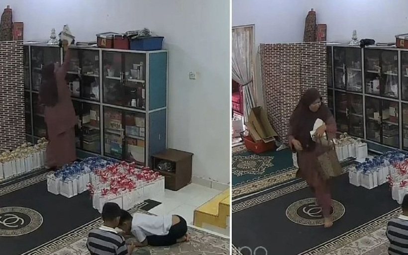 Một "vị khách không mời" đã ngang nhiên trà trộn vào đám cưới, cuỗm đi số tiền mừng mà cô dâu chú rể trân trọng cất giữ. Ảnh cắt từ clip
