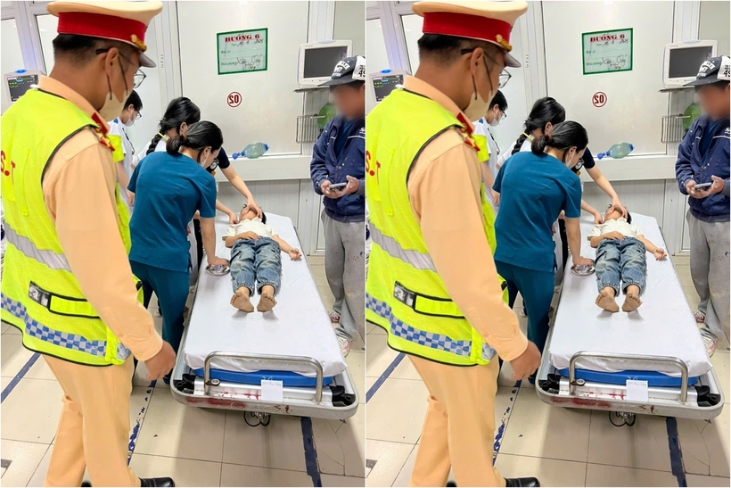 Tổ công tác đã nhanh chóng sử dụng xe chuyên dụng để mở đường, dẫn đoàn đưa cháu bé đến bệnh viện cấp cứu. Ảnh: Báo Xây Dựng