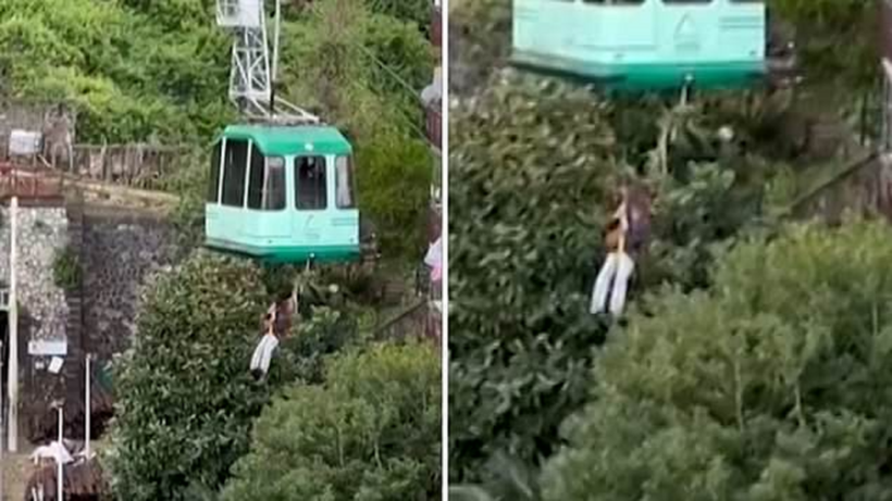 Khoảng 16 hành khách đã được sơ tán, với cảnh quay cho thấy khách du lịch được đưa ra khỏi cabin. Ảnh: Daily Mail