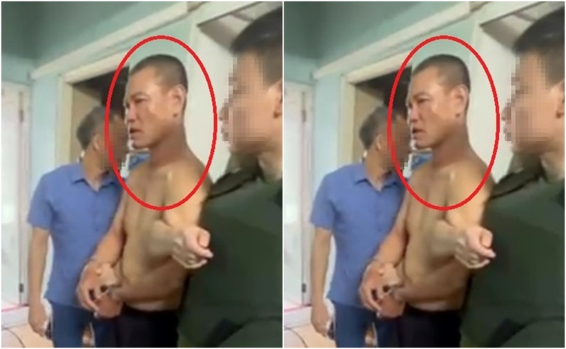Đối tượng Dũng bị lực lượng Công an khống chế sau hơn 1 tiếng đồng hồ cố thủ trong căn hộ chung cư. (Ảnh: Tiền phong)