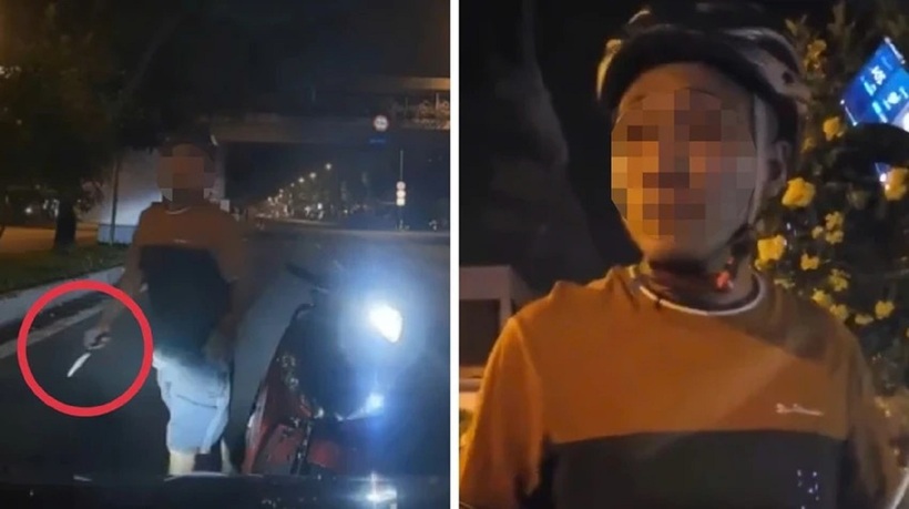 Đối tượng cầm dao chặn đường, đe dọa tài xế ở TP.HCM. Ảnh: Pháp luật TP.HCM