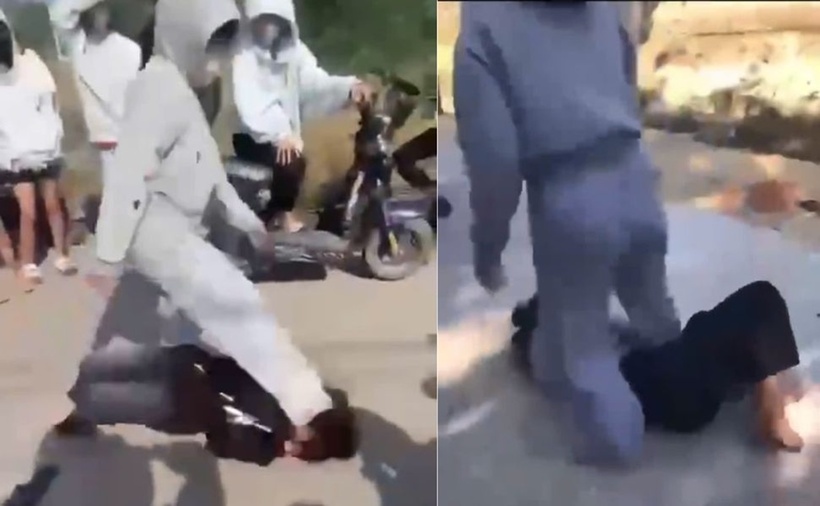 Nữ sinh H (học sinh lớp 7 Trường THCS Mỹ Thành) bị nhóm bạn đánh đập dã man trên đường. (Ảnh: Lao động)