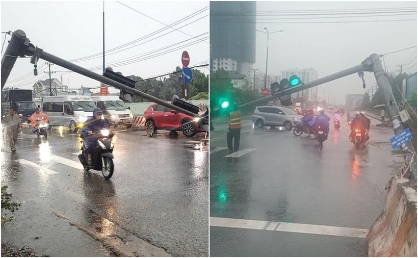 Cột đèn tín hiệu giao thông ngã đổ trên Quốc lộ 13 đoạn KCN Việt Hương (TP. Thuận An, Bình Dương), trong cơn mưa. (Ảnh: Tiền phong)