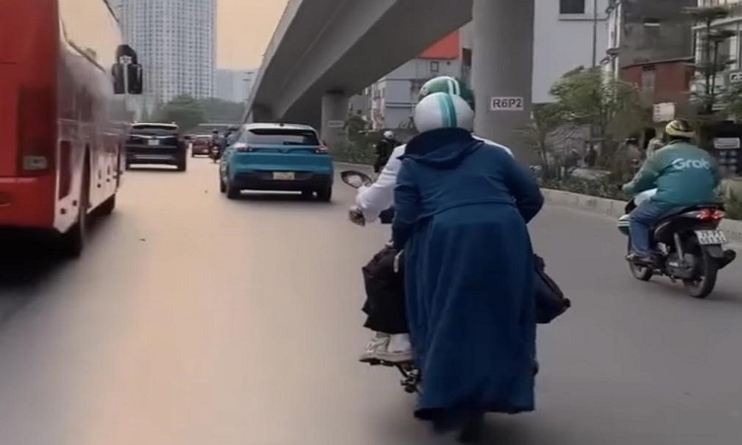 Sử dụng áo chống nắng không đúng cách rất dễ dẫn đến TNGT. Ảnh minh họa