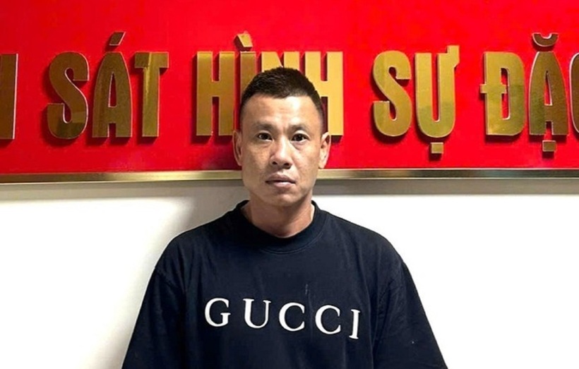 Lê Văn Quang tại cơ quan công an. Ảnh: NLĐ