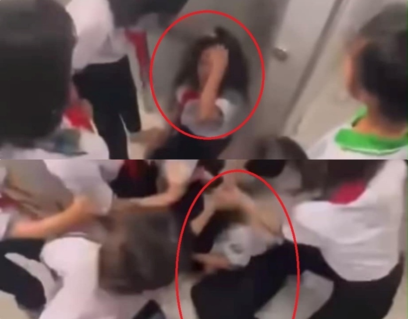 Nữ sinh THCS bị các bạn đánh hội đồng. Ảnh: Báo Tiền phong.