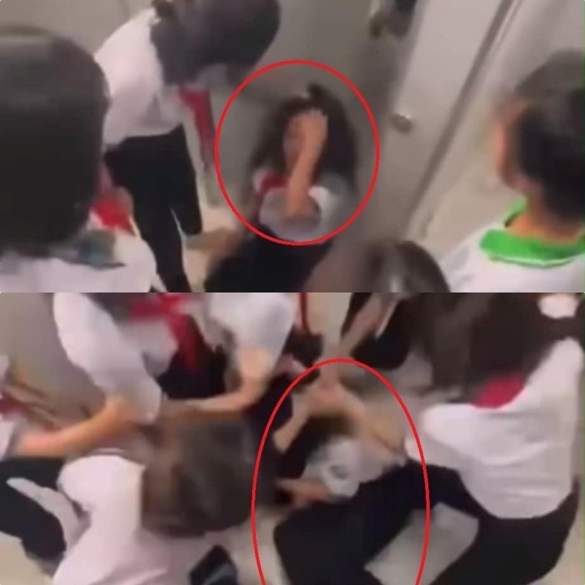 Cả nhóm nữ sinh xông vào đánh hội đồng một nữ sinh. Ảnh: Báo Tiền phong.