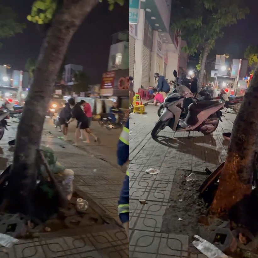 Bốn người đánh nhau dữ dội, từ lòng đường đến vỉa hè. Ảnh: Báo Dân việt.