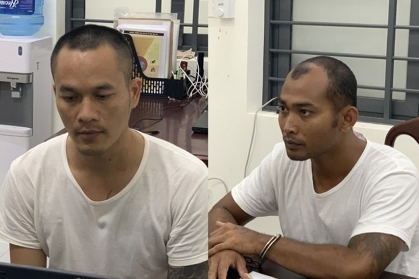 Dương Văn Hoàng và Đào Văn Quý tại cơ quan công an. Ảnh: Lao động