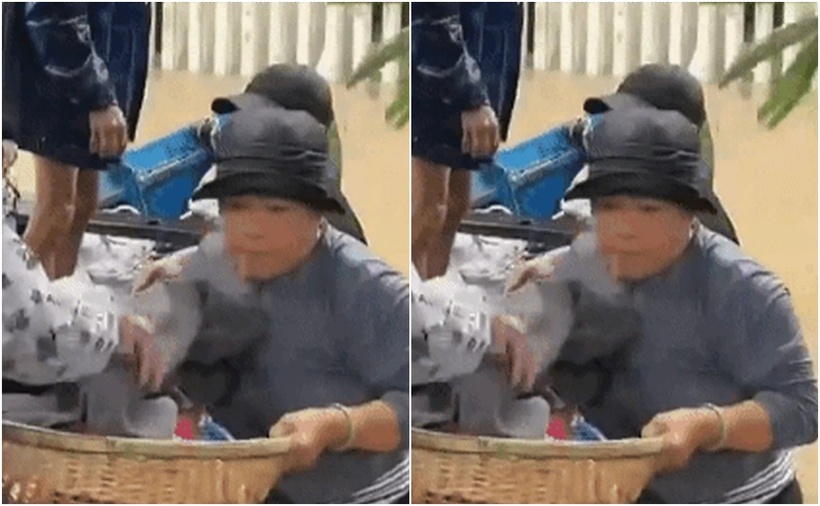 Cháu bé 25 tuổi cùng mẹ bị nhân viên Trạm Y tế Tuy Hòa từ chối tiếp nhận vào tránh lũ nên phải di chuyển tìm nơi ẩn náu an toàn khác. (Ảnh: Dân trí)