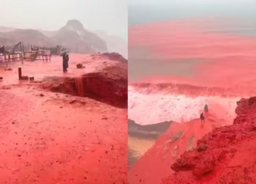 Những "thác nước" nhỏ màu đỏ chảy từ vách đá xuống bãi biển đảo Hormuz. Ảnh: X.