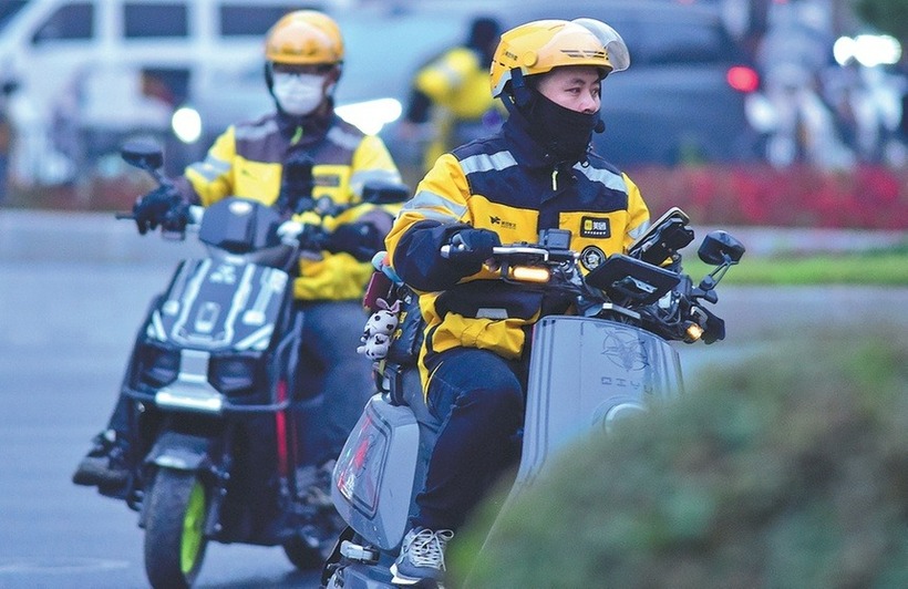 Các nhân viên giao hàng được đào tạo chuyên nghiệp để mở rộng cơ hội làm việc, thăng tiến. Ảnh: China Daily