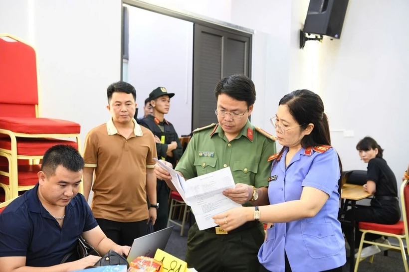 Cơ quan chức năng điều tra, làm rõ đường dây đa cấp trái phép. Ảnh: Lao động