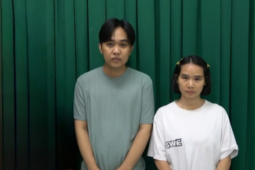 Huỳnh Văn Lam và Nguyễn Thị Thu Hà tại cơ quan công an. Ảnh: Báo Người lao động.