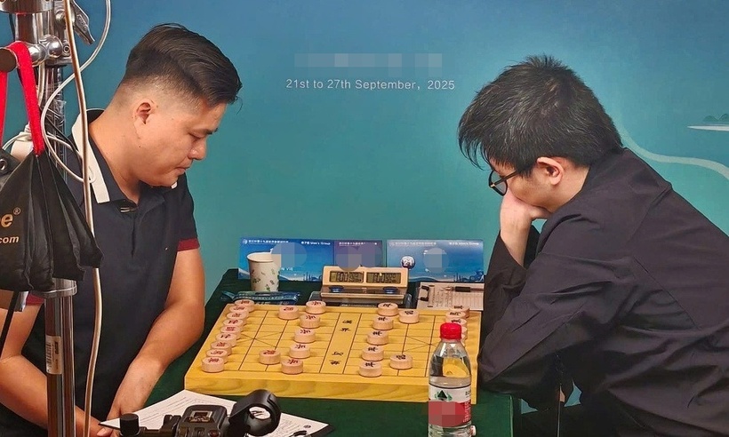 Lại Lý Huynh đánh bại "thần đồng" Trung Quốc, lên ngôi Vương thế giới. Ảnh: Báo Dân trí.