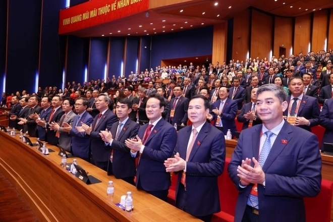 Các đại biểu dự phiên thảo luận tại hội trường về các văn kiện Đại hội, chiều 21/1. Ảnh: TTXVN