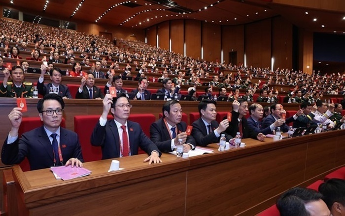 Đại hội biểu quyết thông qua số lượng Ủy viên BCH Trung ương Đảng khóa XIV. Ảnh: TTXVN.