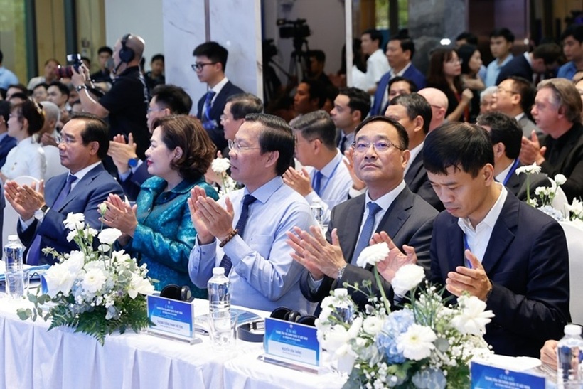 Các đại biểu tham dự lễ ra mắt Trung tâm Tài chính Quốc tế Việt Nam tại TPHCM - Ảnh: VGP/Nhật Bắc
