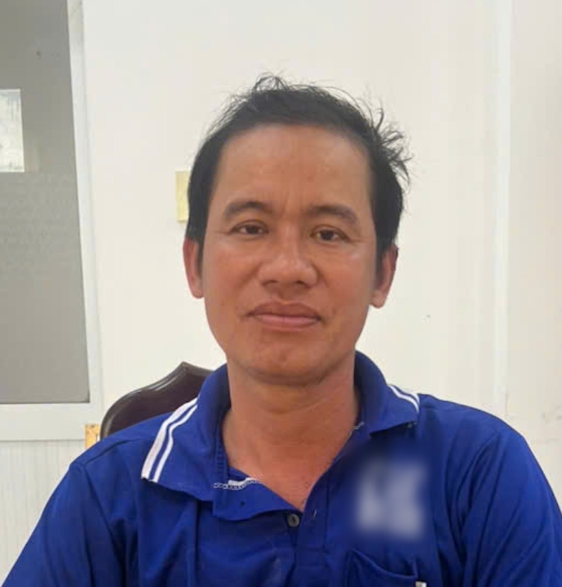 Nguyễn Việt Thanh tại cơ quan công an. Ảnh: Lao Động.