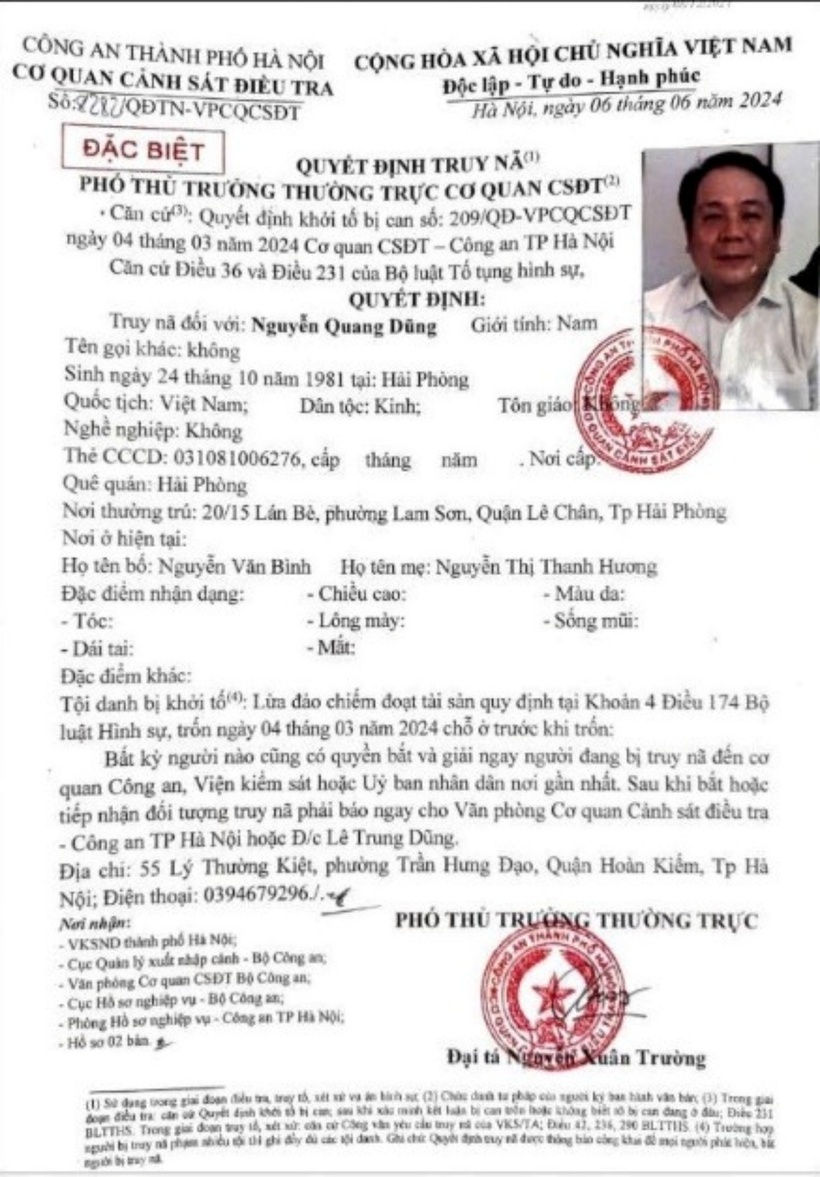 Quyết định truy nã Nguyễn Quang Dũng. (Ảnh: Công an TP.Hà Nội)