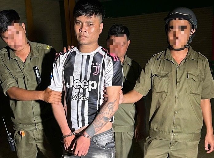 Đối tượng Trần Quốc Nghiêm bị bắt giữ. Ảnh: Người lao động