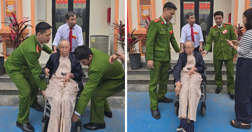 Công an phường Khương Đình hỗ trợ cử tri 92 tuổi tham gia hoạt động bỏ phiếu.