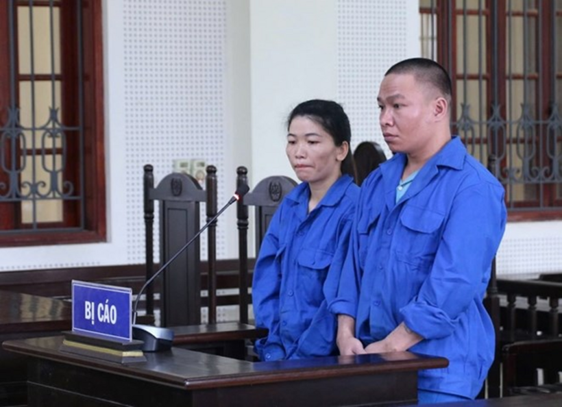 Hai bị cáo Lương Văn Thuận và Pay Thị Ngoạn. Ảnh: Lao động