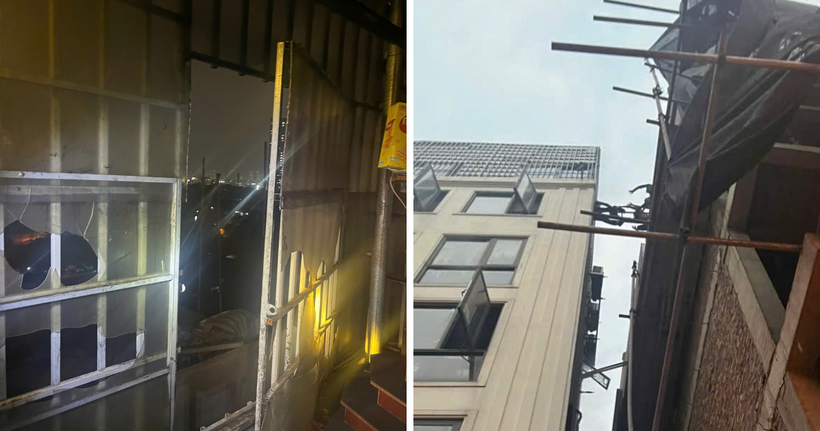 Lực lượng Cảnh sát PCCC&CNCH cứu người lối thoát nạn khẩn cấp qua thang sang nhà bên cạnh.