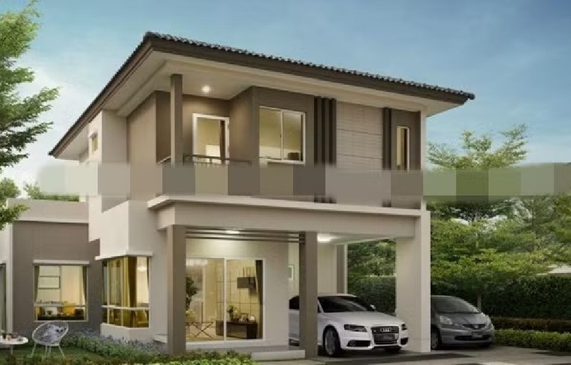 Thiết kế nhà mái thái hiện đại với tầng trệt lùi vào sâu lấy không gian cho chỗ để xe.