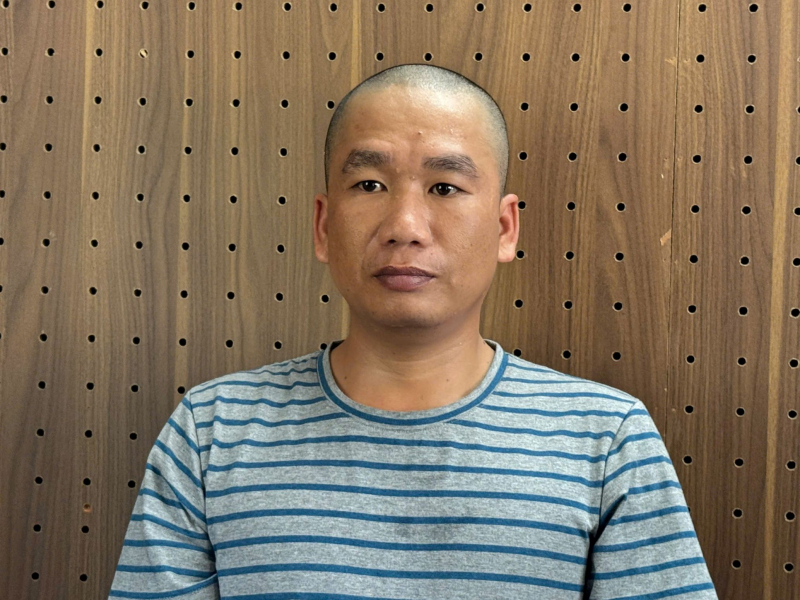 Nguyễn Thanh Tùng tại cơ quan công an. Ảnh:&nbsp; CAND