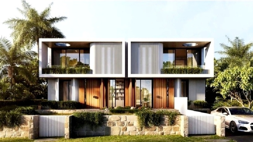 Mẫu biệt thự song lập 2 tầng được thiết kế đơn giản, tận dụng các khung cửa kính lấy sáng tối đa. (Ảnh: Vinavic)