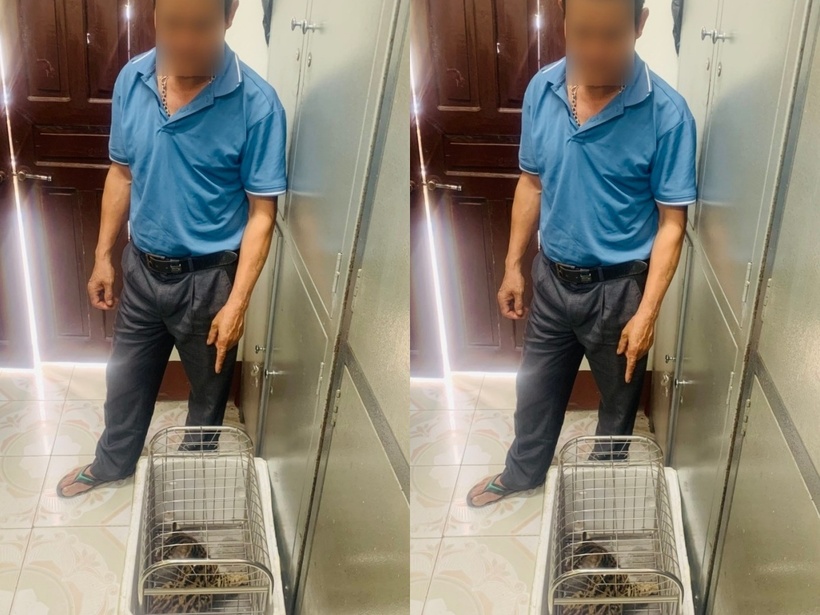 Ông N.V.K cùng cá thể mèo rừng bị nuôi nhốt trái phép. Ảnh: Công an tỉnh Phú Thọ.