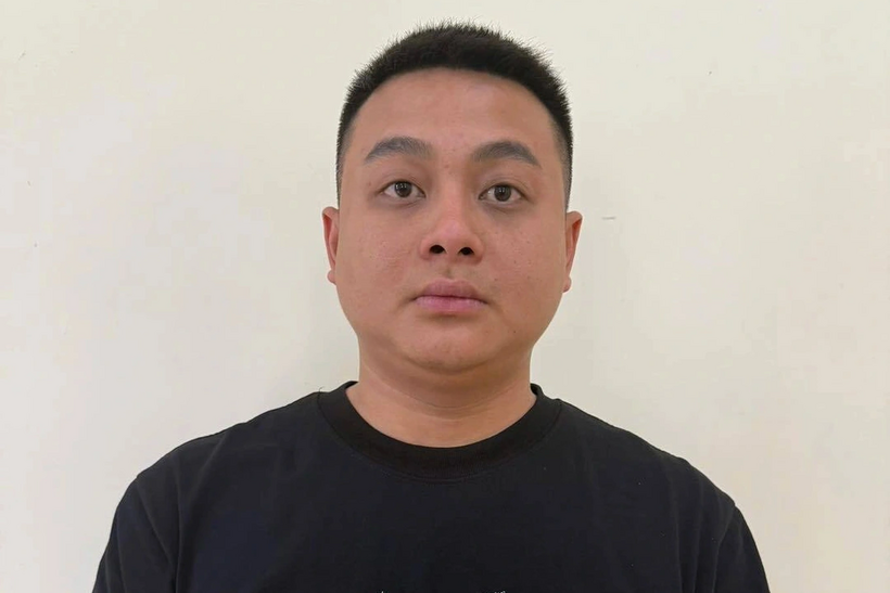 Vũ Quang Tiến tại cơ quan công an. Ảnh: Báo Dân trí.