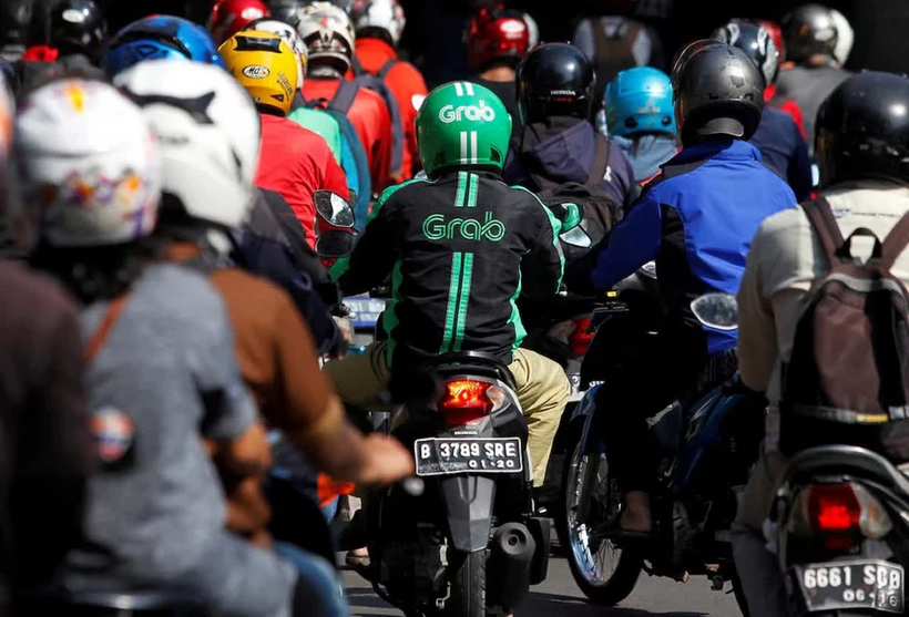 Tài xế công nghệ Grab hoạt động trong giờ cao điểm tại Jakarta, Indonesia. Ảnh: Reuters