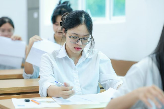 Bộ GD&ĐT cho biết, bách phân vị áp dụng giữa các tổ hợp cùng ngành trong tuyển sinh năm 2026. Ảnh: Lao động