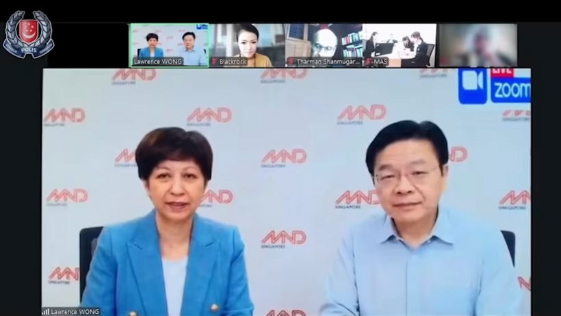 Ảnh chụp màn hình đoạn video do AI tạo dựng, giả mạo một cuộc họp Zoom với các quan chức cấp cao, bao gồm Thủ tướng Lawrence Wong (phải) và Bộ trưởng Indranee Rajah. Ảnh: Lực lượng Cảnh sát Singapore