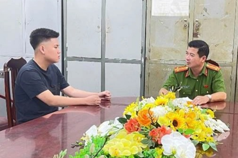 Trần Bình Minh tại cơ quan công an (Ảnh: Công an Hà Nội).