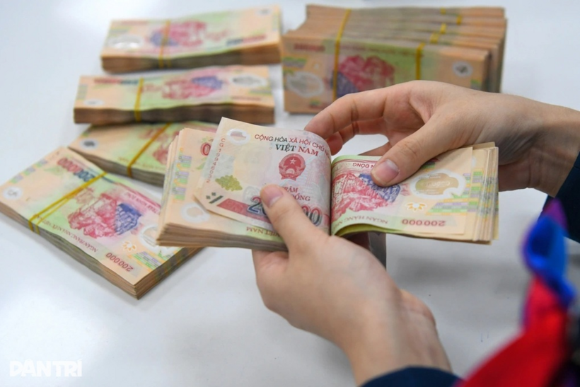 Nhiều doanh nghiệp có tiền gửi ngân hàng (Ảnh: Mạnh Quân).