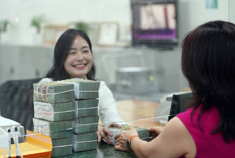 Lãi suất huy động giảm.&nbsp;ẢNH: NGỌC THẮNG