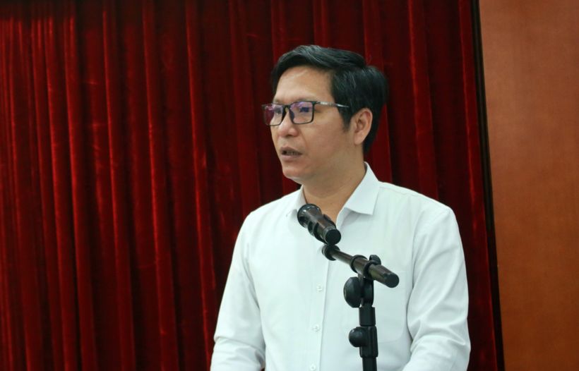 Ông Đàm Thanh Tuấn - Phó Trưởng ban Tổ chức – Hành chính, Hội Luật gia Việt Nam báo cáo tại Hội nghị.