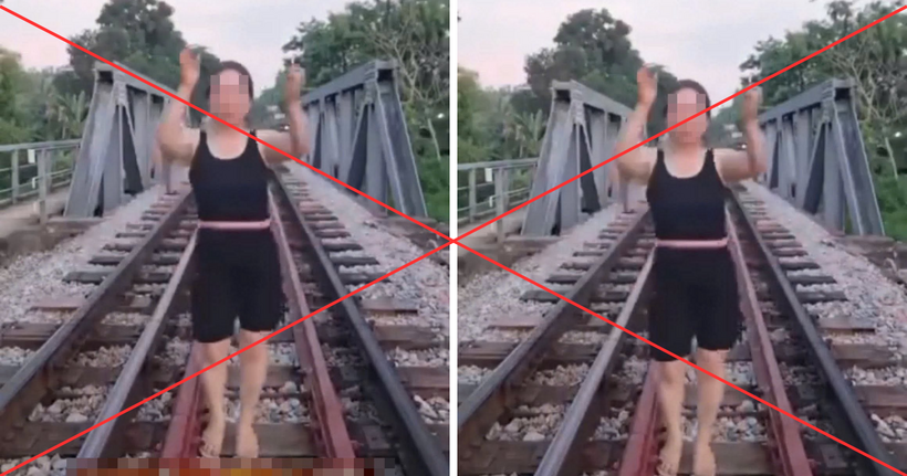 Hình ảnh bà L tập thể dục ở đường ray tàu hỏa. (Ảnh cắt clip)