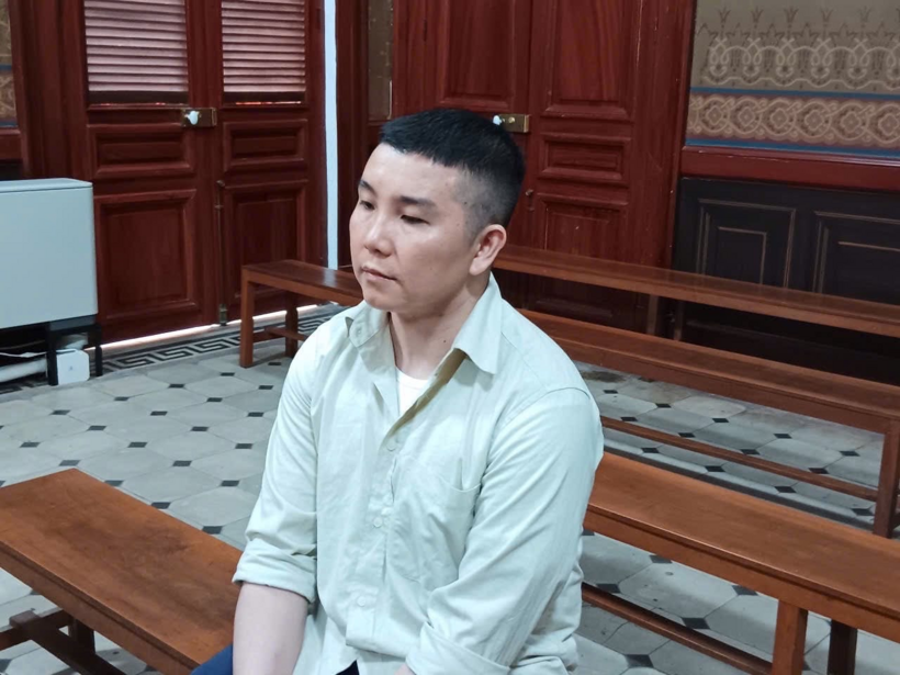 Nguyễn Mai Bình tại tòa. Ảnh: Công an Nhân dân